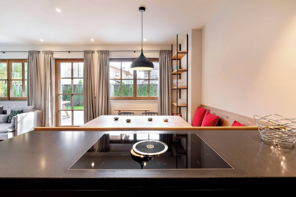 Fully equipped kitchen in Garden Suite Kirchberg, ideal for guests booking a vacation apartment with kitchen in Tyrol.