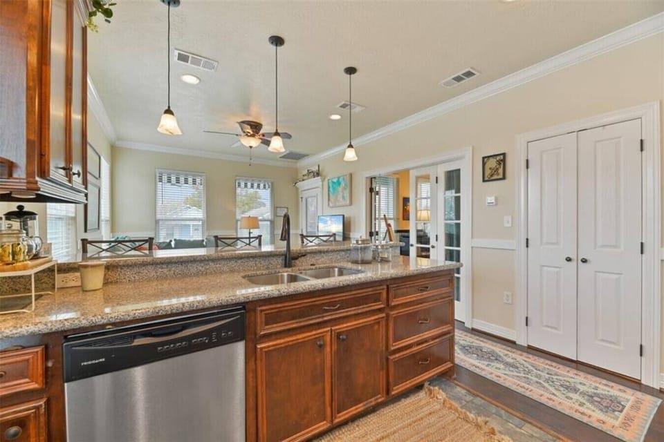 Rich wood cabinetry adds warmth to this classic kitchen