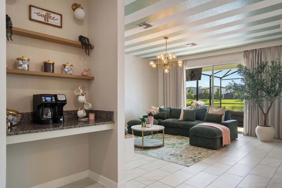 Brew your favorite coffee and settle into the cozy living room for a slow morning with the people you love. Whether you are planning the day’s adventures or simply catching up, this inviting space makes every moment together feel special.