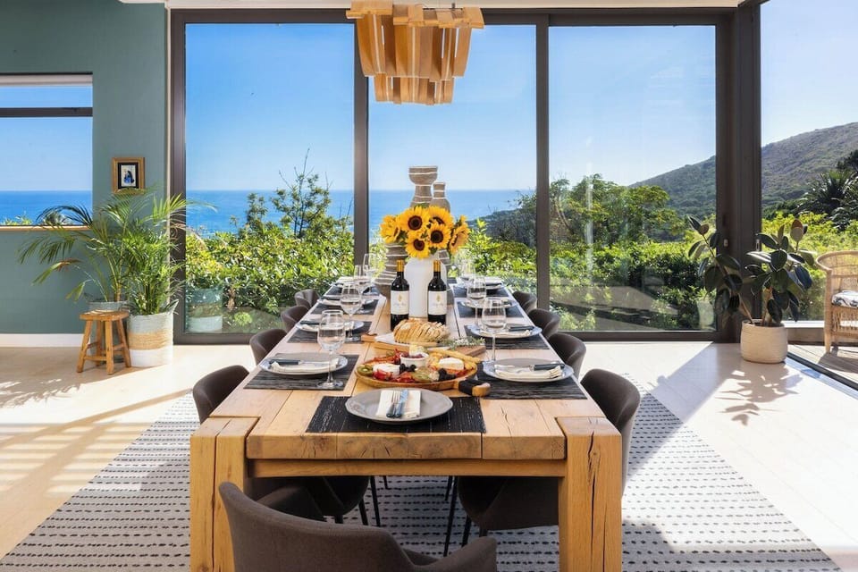 Morning coffee tastes better with panoramic ocean views and the sound of distant waves.