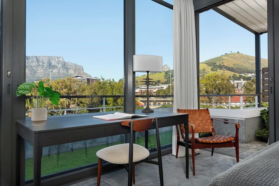 "...Mesmerizing views...the secondary bedroom looks directly upon Table Mountain. Just beautiful..."