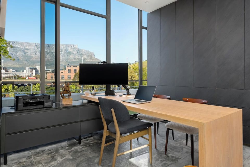 "...stunning penthouse in a great location, particularly great for us was the standalone office room so we could work remotely effectively when traveling. Views of the mountain from the apartment too, it’s really something special..."