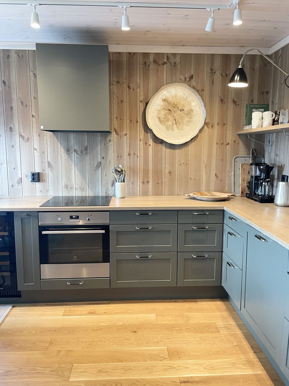 Functional, modern kitchen with stove, oven, and plenty of counter space, ideal for home-cooked meals.
