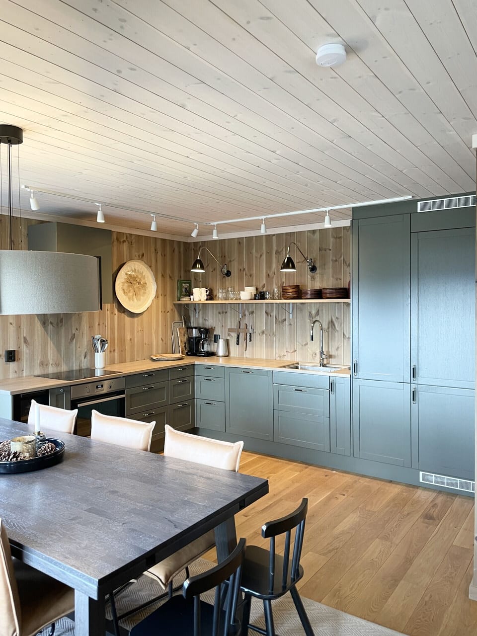 Functional, modern kitchen with stove, oven, and plenty of counter space, ideal for home-cooked meals.