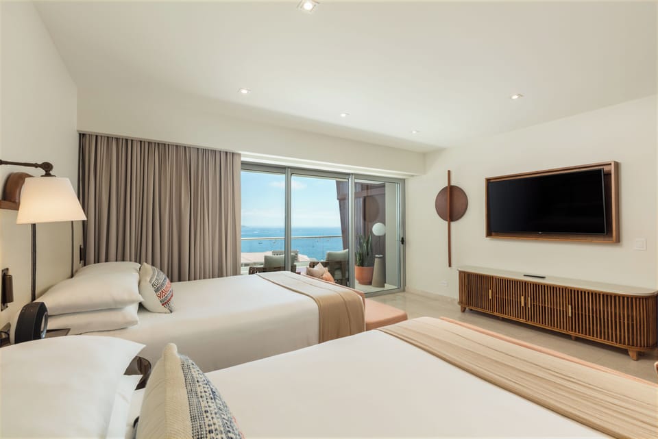 Comfortable Unit with 2 Queen beds. Exact unit will be assigned upon arrival. Views, colors and decor may vary.
