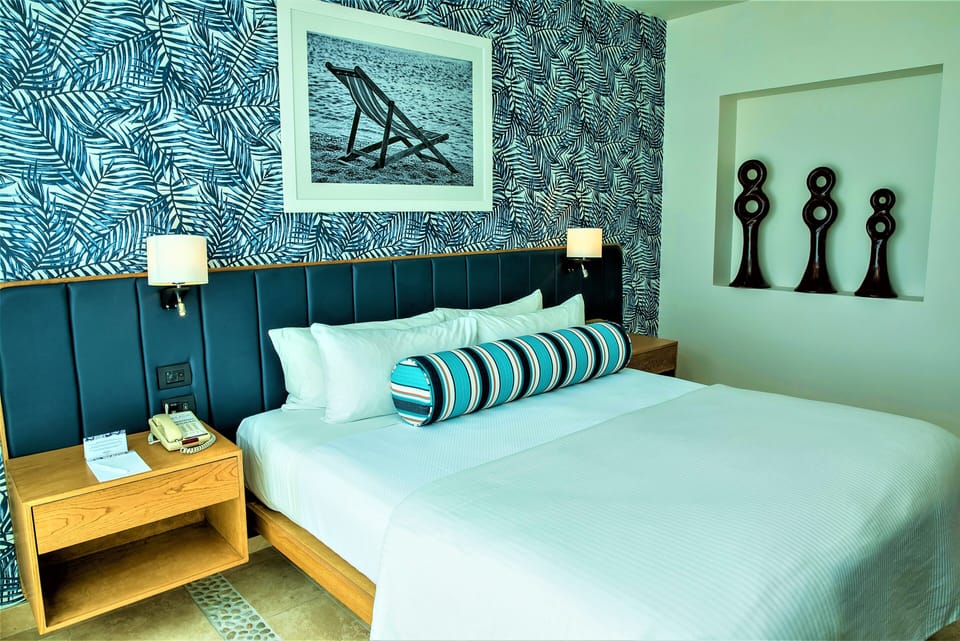 Recharge in a stylish space with playful patterns and comfort.