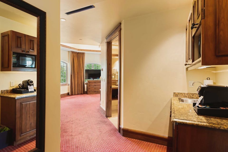Brew morning coffee easily with the in-room kitchenette setup.