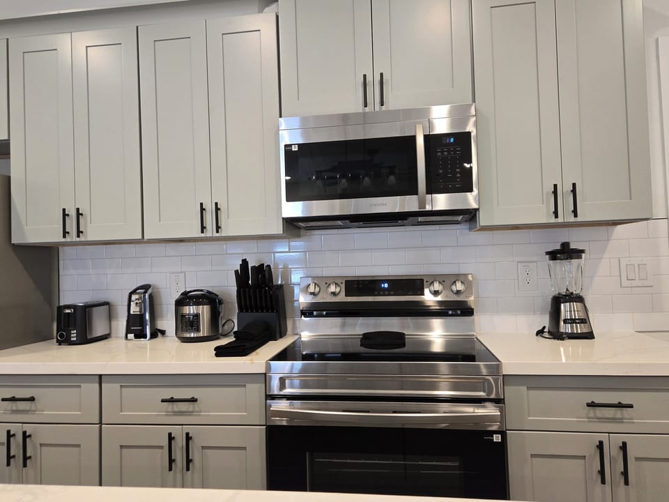 Modern kitchen with stainless appliances and plenty of prep space