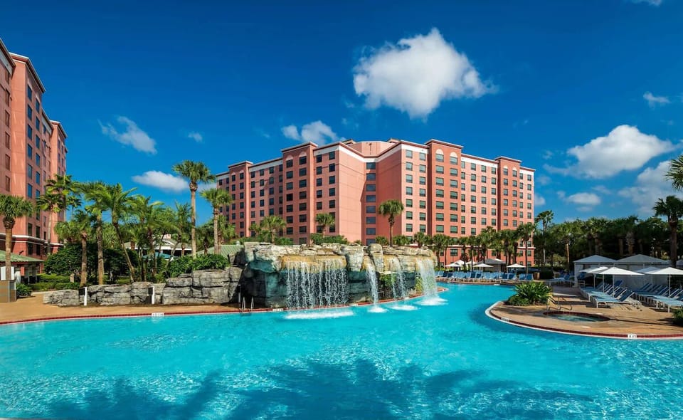 Unwind beside the cascading rock waterfall and sparkling lagoon pool.