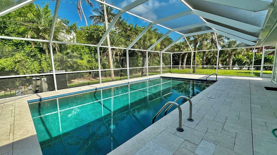 Screened, heated pool.