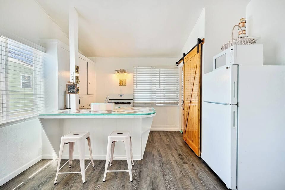 Gather around the kitchen island for coffee or cocktails.