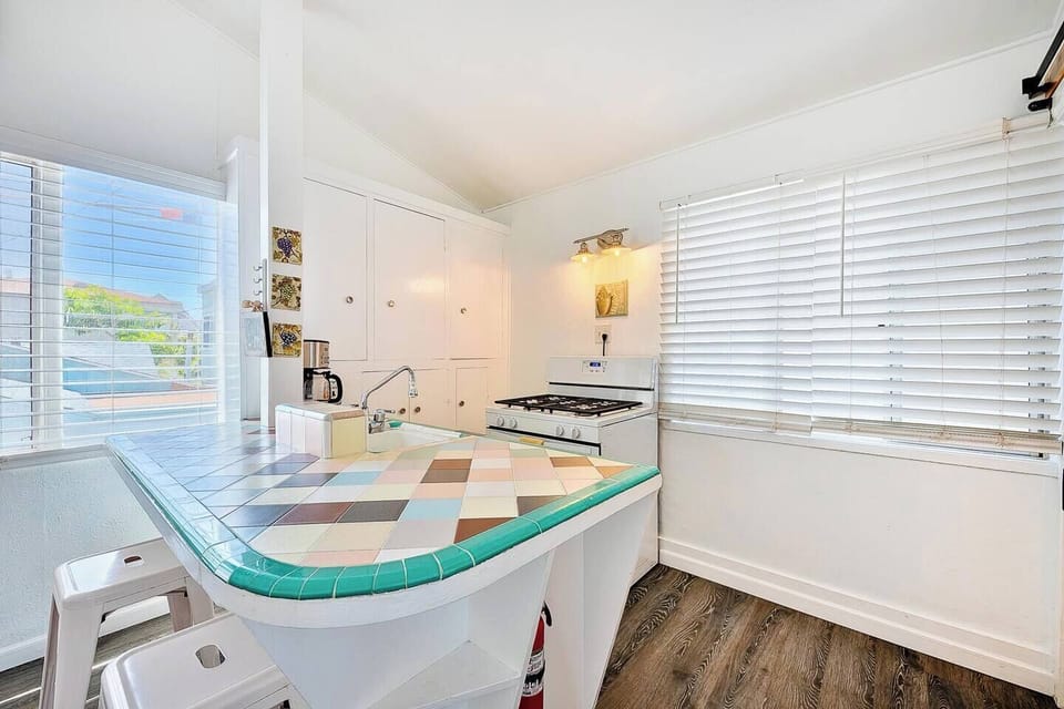 A retro-tiled kitchen ready for beachside breakfasts.