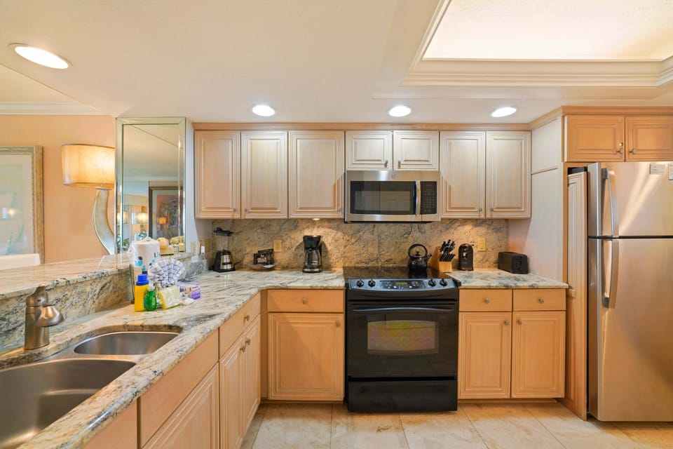Feel at home in this fully equipped beachfront kitchen with spacious countertops, modern appliances, and everything you need for your Emerald Coast vacation.