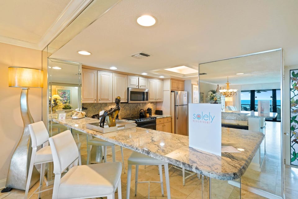 Prepare breakfast before hitting the sand or enjoy an easy dinner at home in this spacious, fully equipped kitchen.