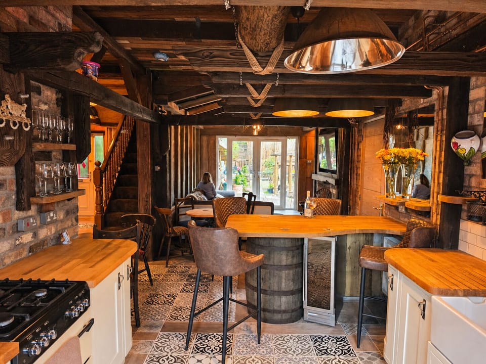 Spacious open-concept kitchen, dining, and living area for relaxing gatherings and comfortable living.