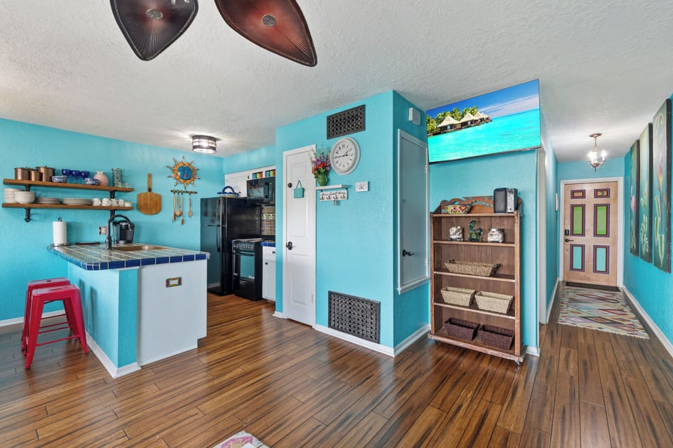 A bright and welcoming living space with coastal-inspired décor and modern comforts.