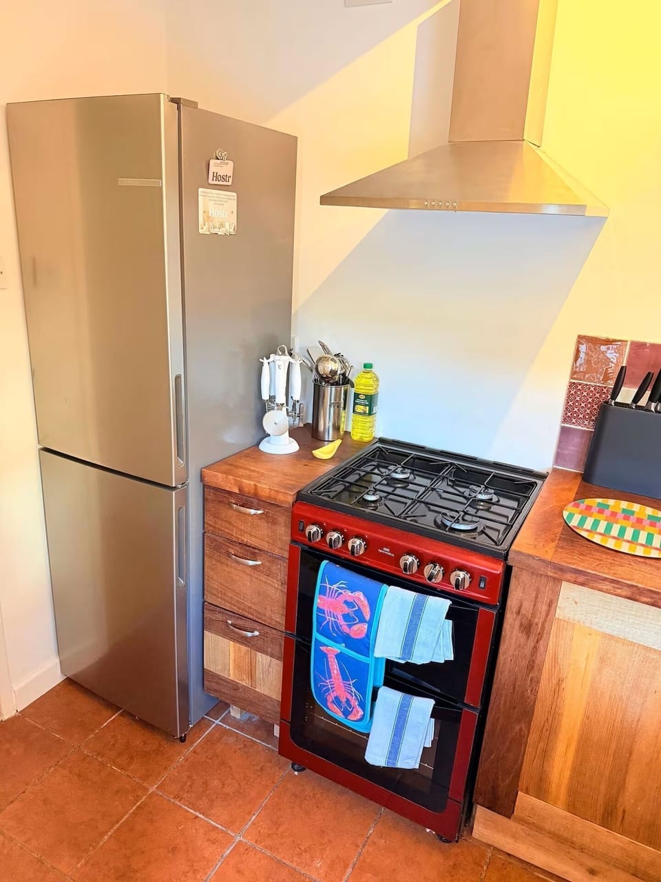 The fully equipped kitchen features a Nespresso machine and a washing machine