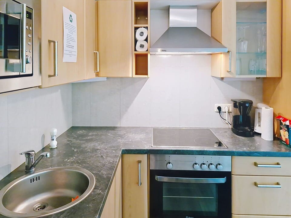 Kitchen Appliance, Kitchen, Countertop, Major Appliance, Cabinetry, Flooring, Interior Design, Kitchen Sink, Home Appliance, Furniture