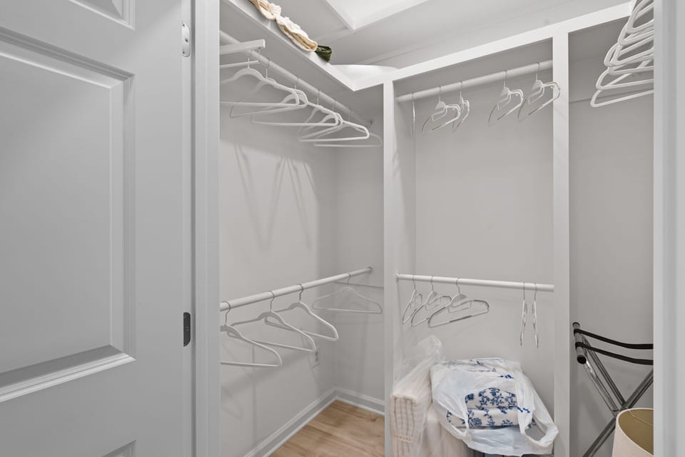 Downstairs private primary bedroom walk-in closet 