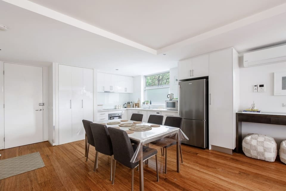 Gather around the six-seater dining table for homemade meals or takeaway from nearby eateries.