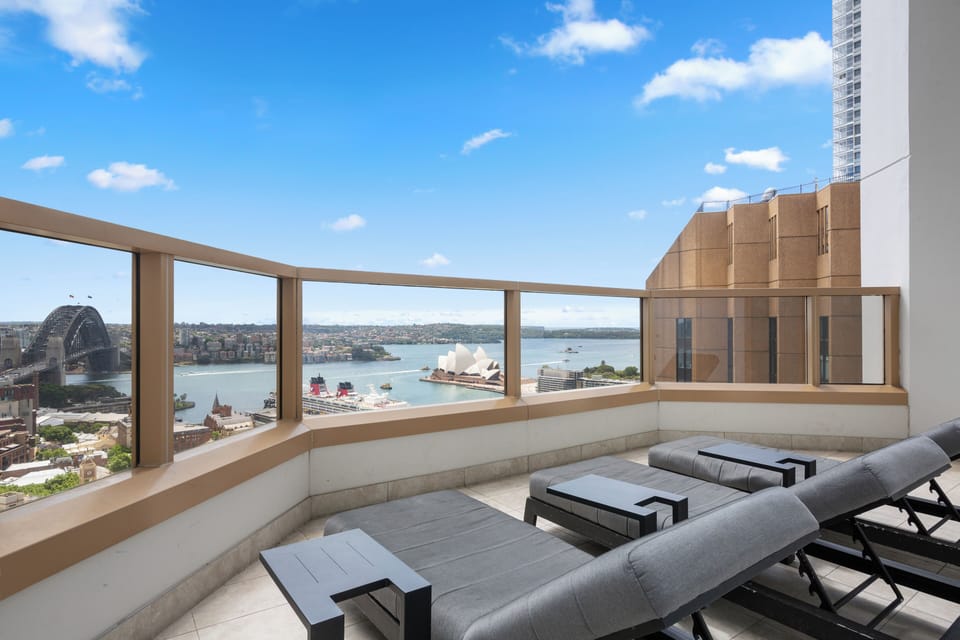 Stretch out on the shared rooftop loungers and take in uninterrupted views across Sydney Harbour, the Harbour Bridge and Opera House from one of the building's standout communal spaces.