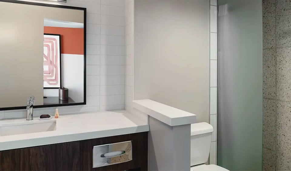 Rinse off in a modern shower after a long day.