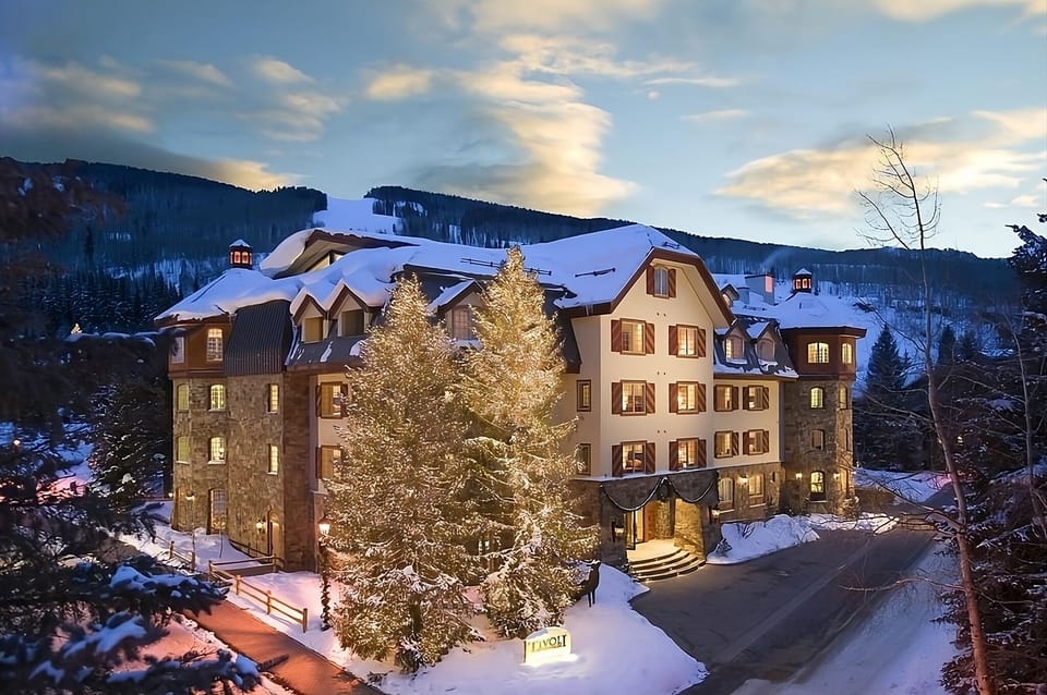 Unwind under twinkling lights as snow falls softly outside