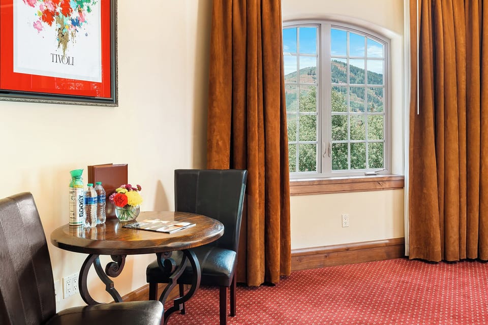 Enjoy a quiet bite by the window in cozy comfort.