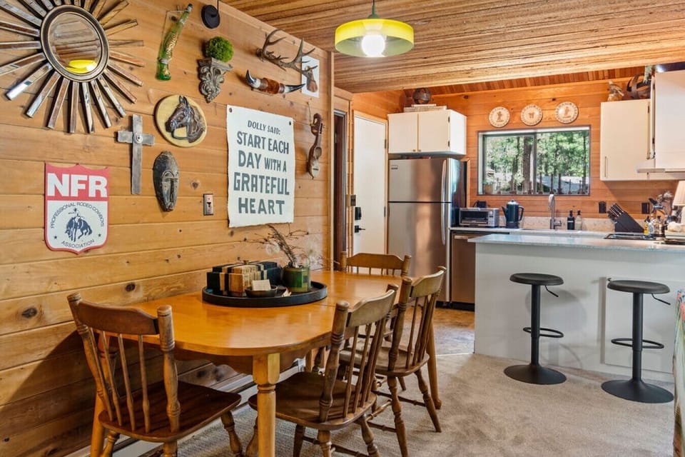 Gather around the dining table for meals, games, and planning tomorrow`s adventures.