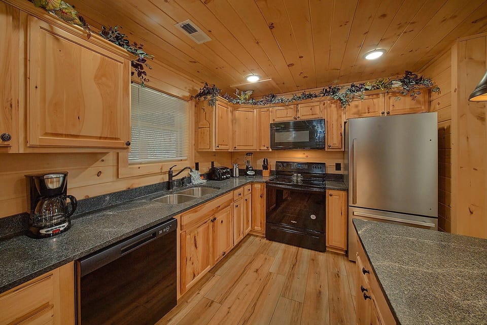 Fully furnished kitchen in Gatlinburg cabin