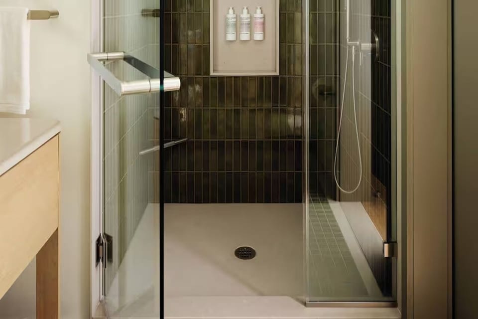 Rinse off in the modern walk-in shower with luxe toiletries.