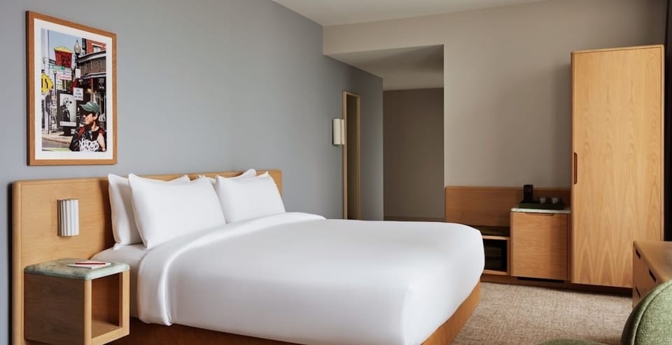 Settle into a serene, minimalist room made for deep sleep.