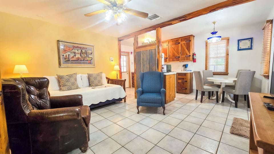Recharge in Shiner Suite’s charming living room area & enjoy a movie night at home​