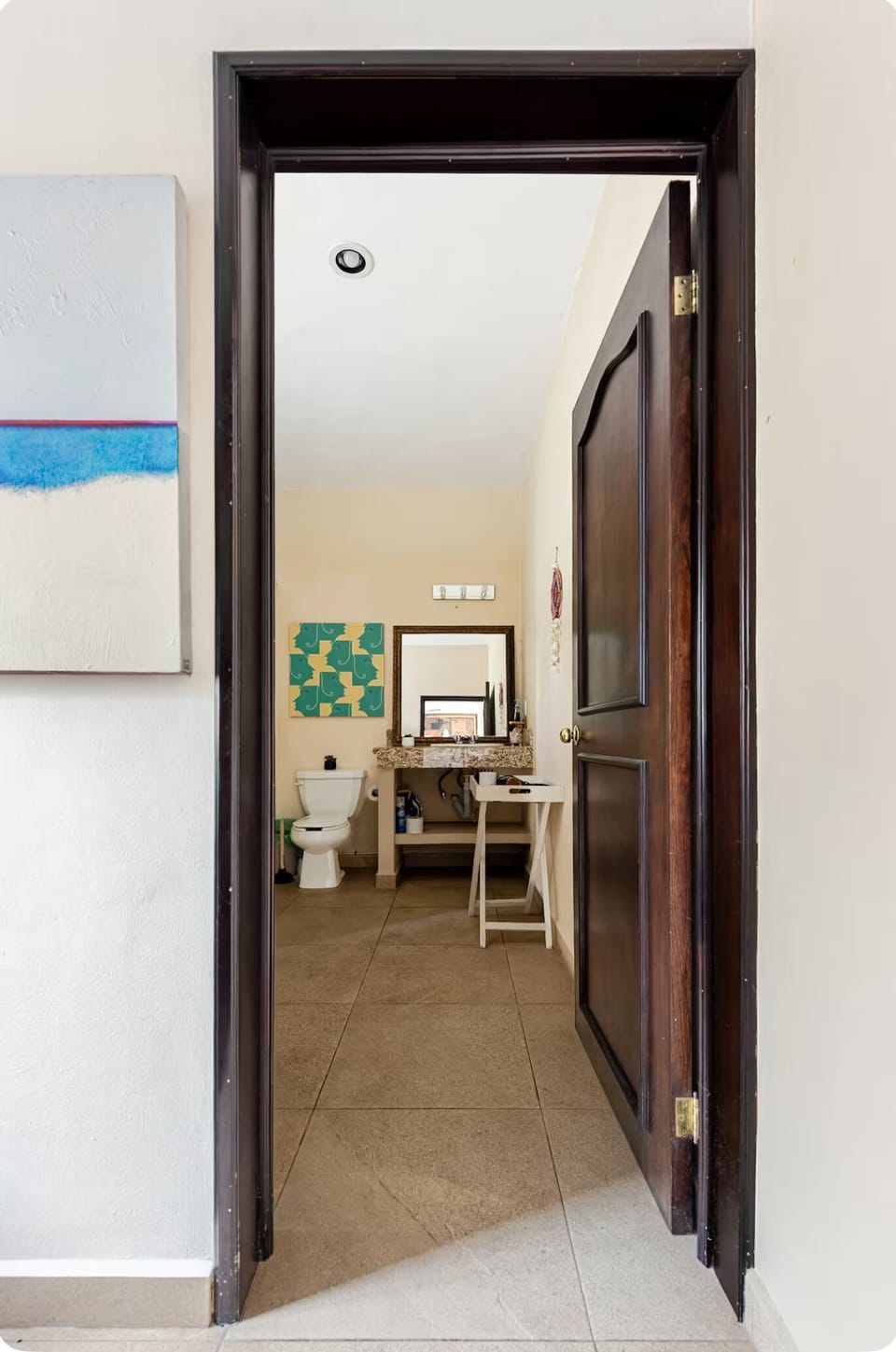 Bathroom entrance, next to sleeping nook. 