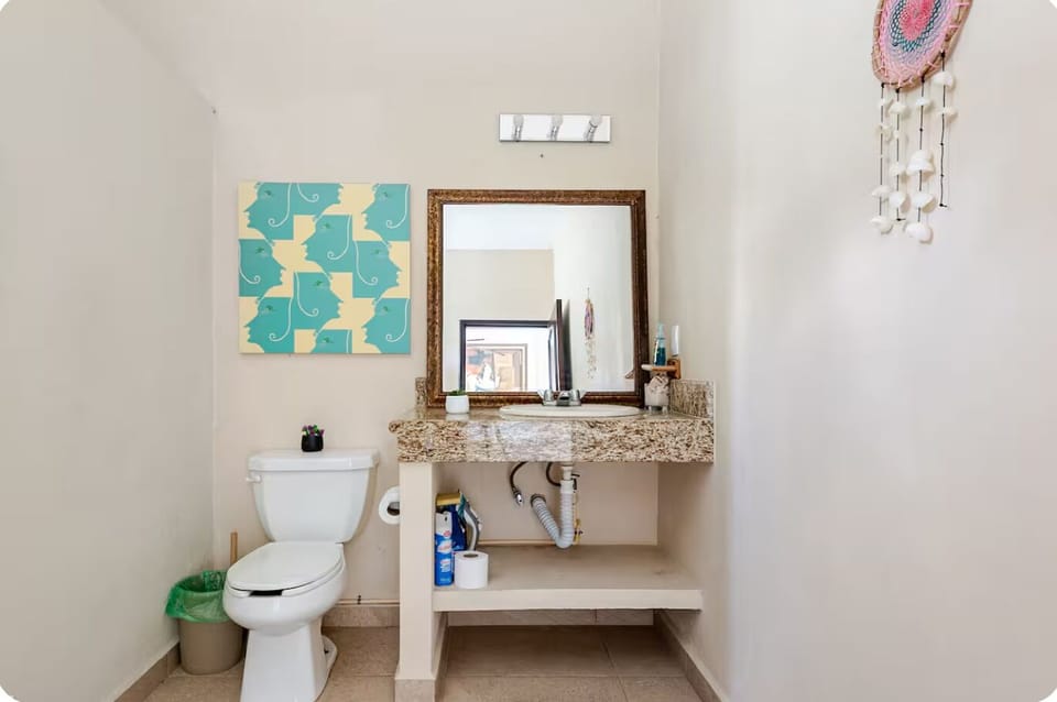Bathroom, toilet and sink. 