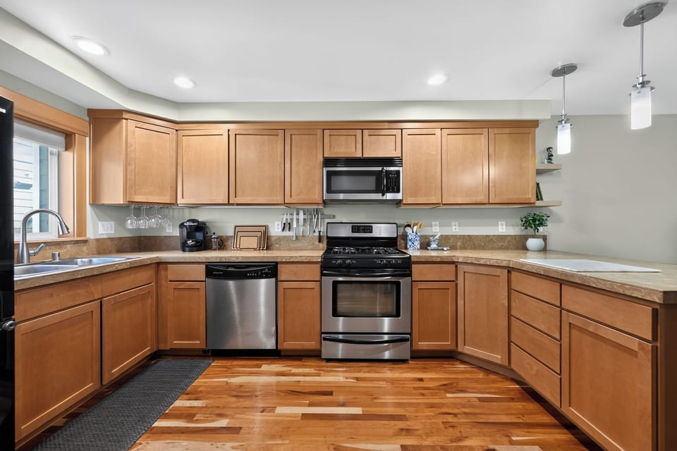 Bright kitchen with stainless appliances and abundant counter space