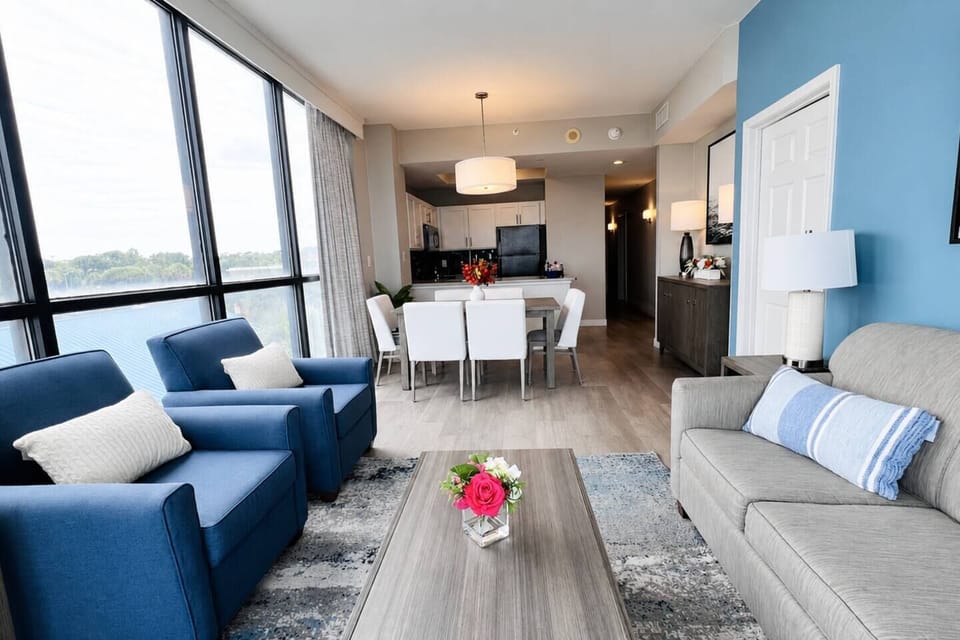 There’s plenty of space for everyone to unwind! The bright, open living area offers comfortable seating and flows into the dining area and kitchen—perfect for movie nights, conversations, and relaxing between Myrtle Beach adventures.