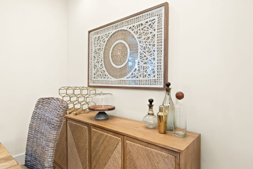 Warm, designer-styled dining corner with natural textures and chic decor