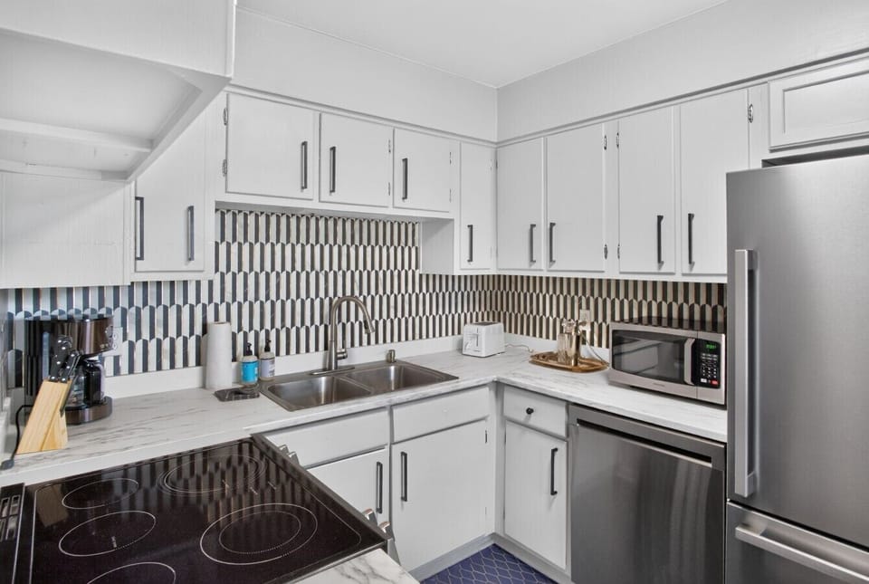 Kitchen | Electric Range | Coffee Station & Stainless Steel Appliances