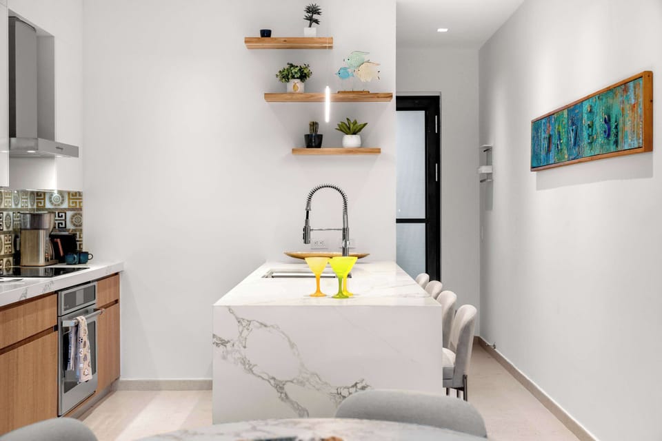 Pull up a seat at the kitchen island for an easy breakfast, snack, or casual meal