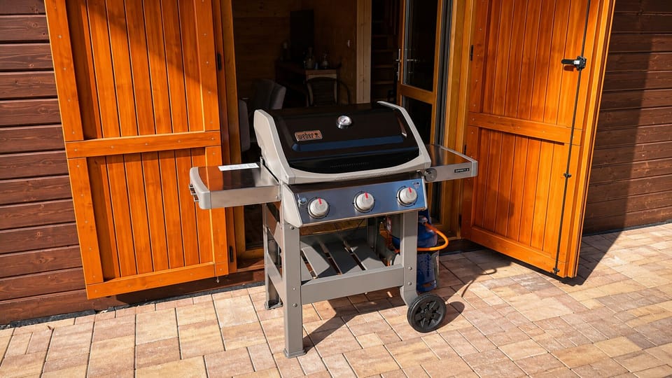 Private patio with gas grill for easy outdoor cookouts