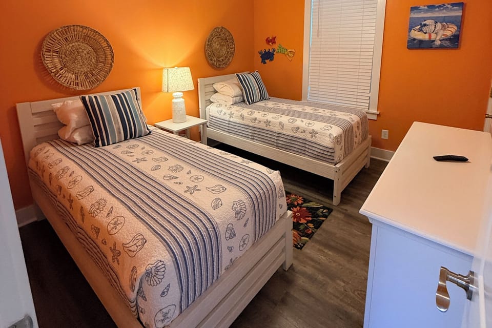 Second bedroom with twin beds.
