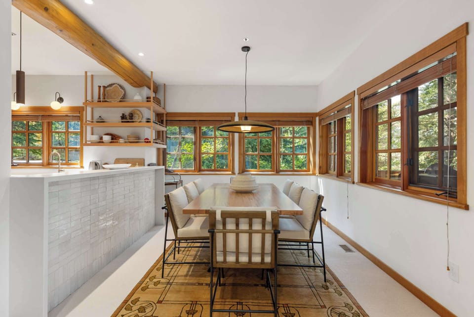 
- Open dining and kitchen area for family gatherings - Whistler chalet with bright interiors and modern design - Perfect alpine home for group stays and celebrations