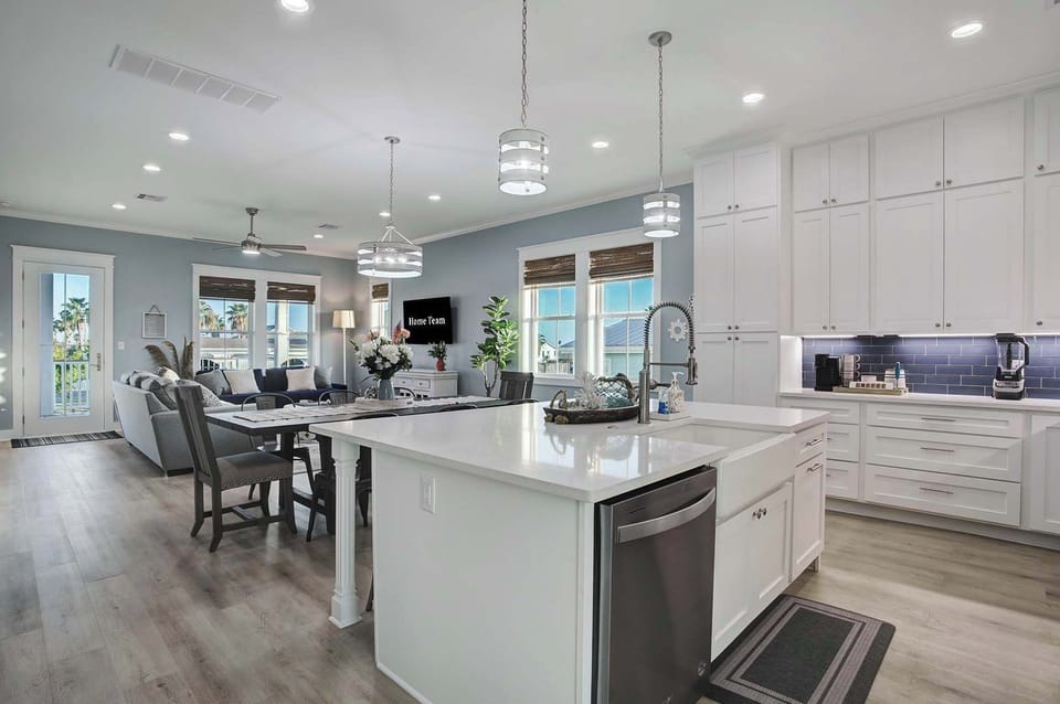 Open-concept living means the cook is never left out of the fun.