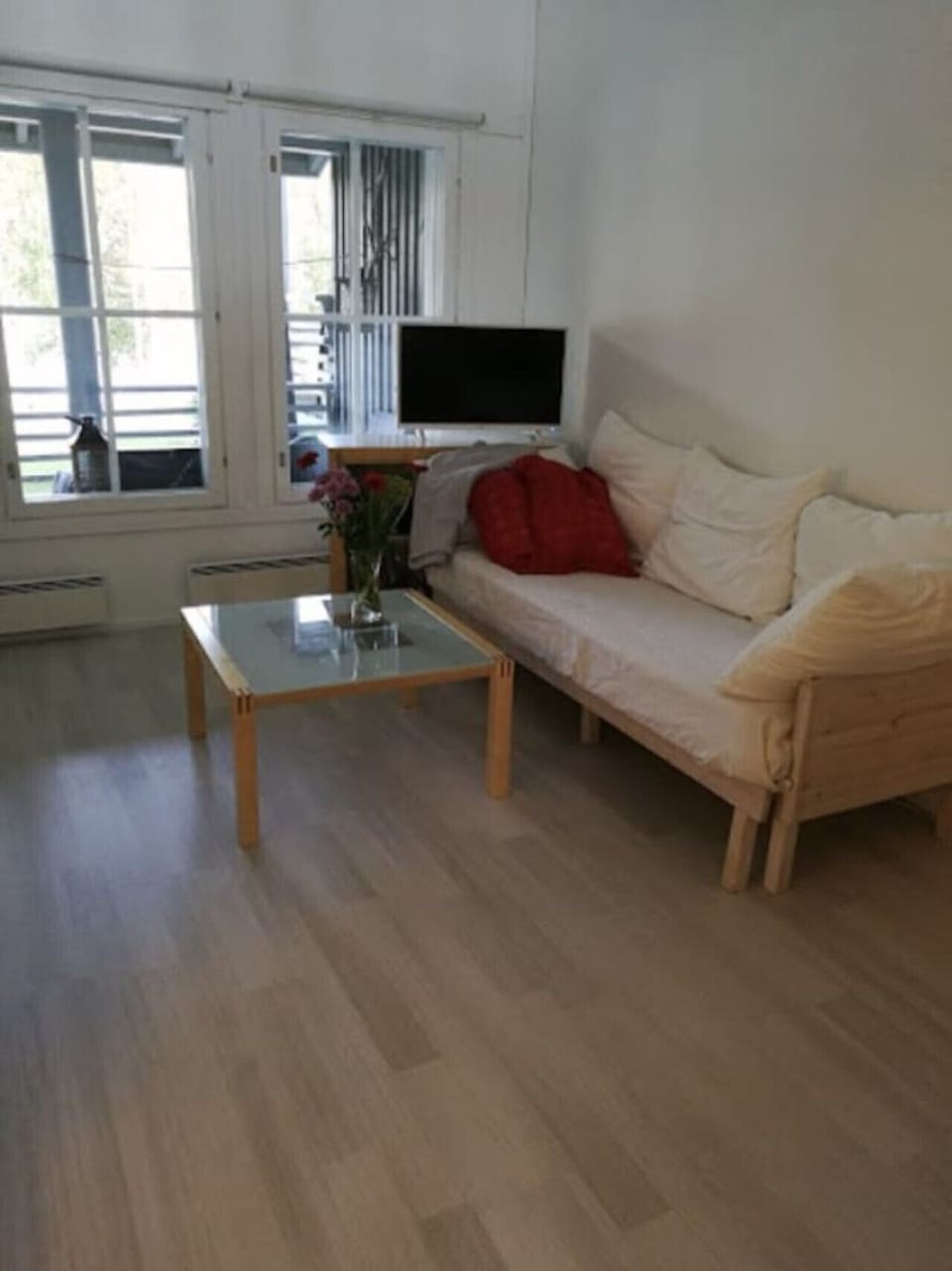 Cosy living room with a comfortable sofa and a coffee table.