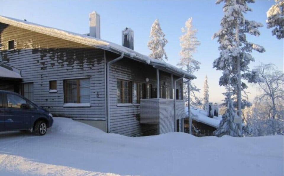 The building in winter, with parking right beside the entrance.