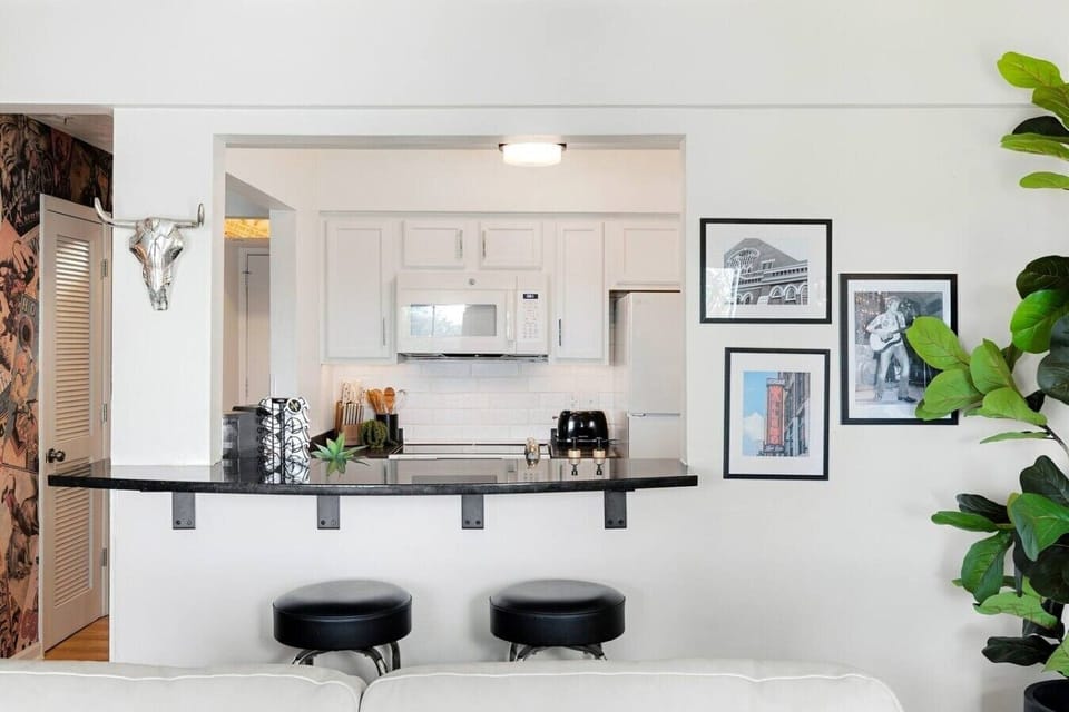 Fully equipped kitchen for all of your cooking needs! Kitchen island has seating for two.