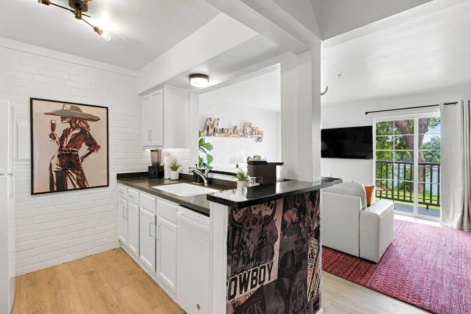 Fully equipped kitchen for all of your cooking needs! Kitchen island has seating for two.