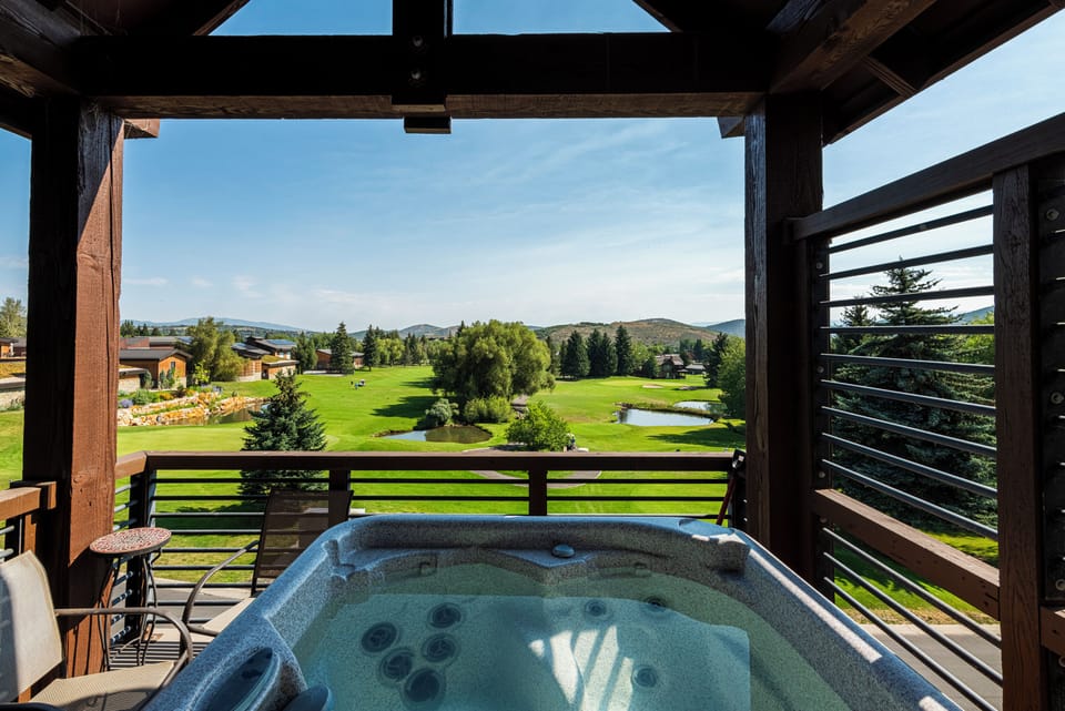 Private hot tub with sweeping golf course and mountain views