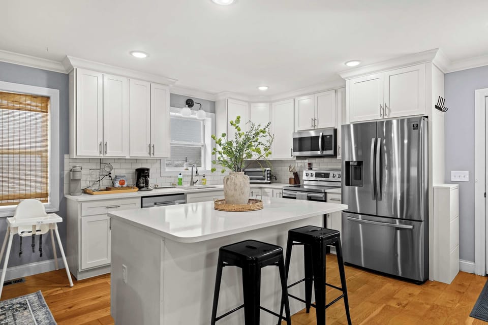 A bright kitchen made for easy mornings and good meals. With plenty of counter space, modern appliances, and a spacious island, you’ll have everything you need to feel right at home.